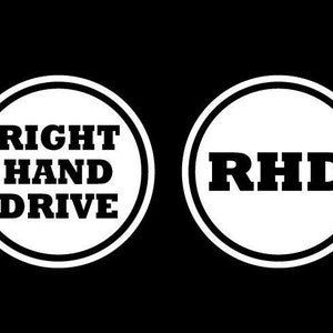May include: Two white circles with black outlines and text. The left circle says "RIGHT HAND DRIVE" and the right circle says "RHD".