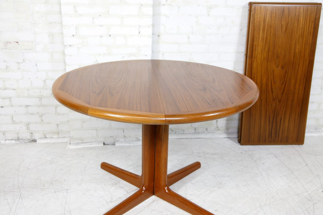 Vintage MCM scandinavian round / oval extendable teak dining table by E.Valentinsen | Free delivery only in NYC and Hudson Valley areas