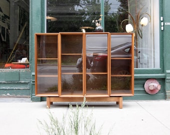 Vintage 60's walnut bookcase / shelving unit w/ 4 wood framed glass doors | Free delivery in NYC and Hudson Valley areas