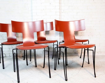 Vintage Mid century modern set of 5 atomic stackable chairs by DONGHIA "Anziano" | Free delivery in NYC and Hudson Valley areas