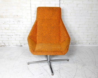 Atomic style orange swivel armchair with tall back by Arcadia Chairs in CA NIOS@ | Free delivery in NYC and Hudson Valley areas