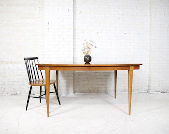 Vintage MCM cherry wood 58" "surfboard" dining table by Broyhill Furniture | Free delivery only in NYC and Hudson Valley areas