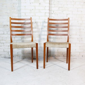 Vintage mcm pair of tall back / ladder back teak dining chairs with new upholstery | Free delivery in NYC and Hudson Valley ares