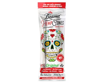 May include: A silver pouch with a white skull design and the text "Beamer Hemp Cones Ultra Premium Since 2010". The pouch contains four king size hemp cones. The text "Original 4x" is printed on the pouch. The pouch also includes the text "No Chlorine No Pesticides GMO Free No Bleach Vegan No tobacco Slow burn www.BeamerSmoke.com".