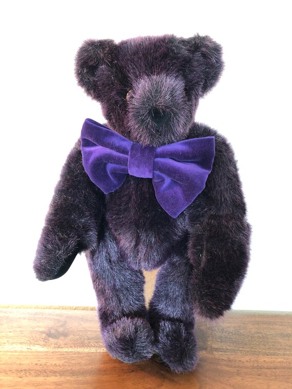 teddy bear with purple bow tie