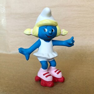 Ceramic Smurfette Figurine on Roller Skates