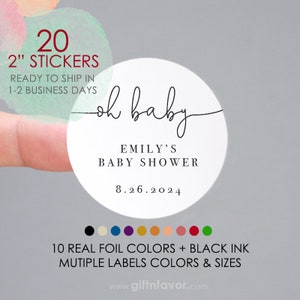May include: 20 round stickers with the text "oh baby" in a script font, "Emily's Baby Shower" and the date "8.26.2024". The stickers are 2 inches in diameter and are available in 10 real foil colors with black ink.
