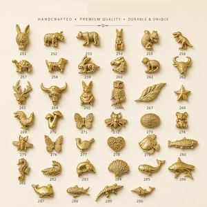 May include: A collection of small gold-toned metal charms arranged in a grid, featuring various animal, insect, and nature-inspired shapes. Each charm is labeled with a unique identification number from 251 to 290, displayed on a light background.