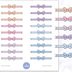 May include: A sheet of pastel-coloured bow divider stickers. The stickers feature a variety of colours, including peach, pink, purple, and blue. The text "Row Divider Stickers" is printed at the bottom of the sheet.