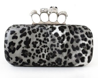 purse with brass knuckle handle