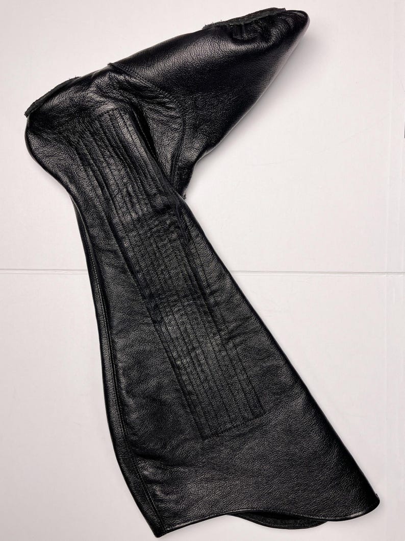 A black leather boot is shown in the image.