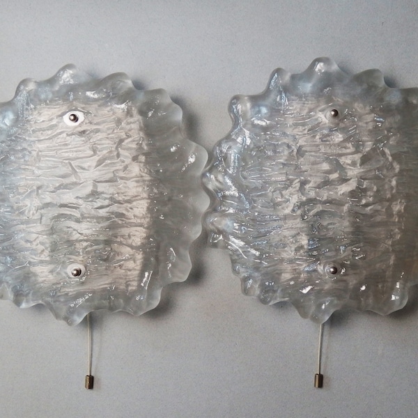 Pair of large 70's Peill and Putzler sconces with thick texturized glass domes and stainless steel base