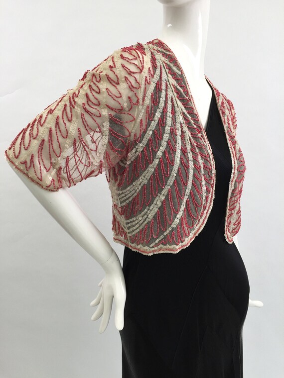 1920s beaded sequinned jacket in white and red bea