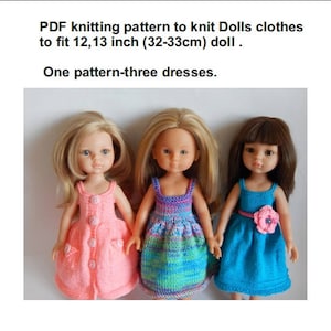 May include: Three dolls wearing knitted dresses. The dresses are pink, blue and green with a multi-colored pattern. The dolls are 12-13 inches (32-33 cm) tall. PDF knitting pattern to knit Dolls clothes.