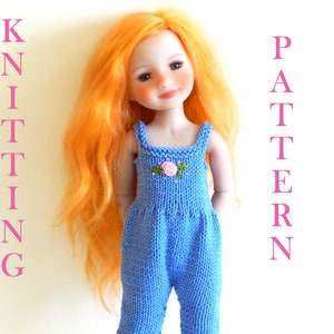 May include: Knitting pattern for a blue knitted jumpsuit with a pink flower detail. The pattern is for a doll, and the doll is wearing the jumpsuit in the image. The text "KNITTING PATTERN" is written vertically in pink letters on the left side of the image, and the text "PATTERN" is written vertically in pink letters on the right side of the image.
