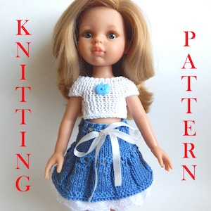May include: Knitting pattern for a doll outfit, featuring a white short-sleeved top with a blue apple button and a blue skirt with a white ribbon.