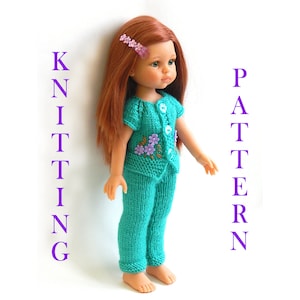 May include: Knitting pattern for a teal doll outfit with a button-up top and pants. The top has embroidered flowers in purple and white.