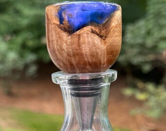 Maple burl and resin bottle stopper.