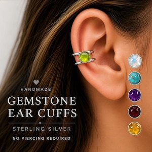 May include: A handmade sterling silver ear cuff with a round, light green gemstone. The image also shows a selection of gemstone studs in white, turquoise, purple, red, and yellow. The text on the image reads "Gemstone Ear Cuffs, Sterling Silver, No Piercing Required."