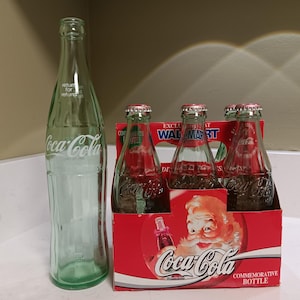 Coca-Cola 1994 à collectionner - Fêtes du Père Noël : 5 bouteilles de 8 oz et 1 bouteille de 16 oz