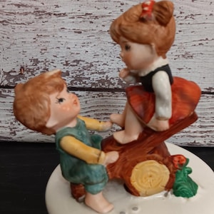 Vintage 1970&#39;s Lefton Music Box - Girl & Boy on Seesaw- Song &quot;Fly Me To The Moon&quot;