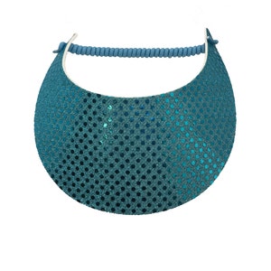 May include: A teal blue visor with a sequined pattern. The visor has a blue elastic band.