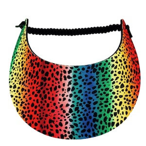 May include: A rainbow-colored visor with a black elastic band. The visor features a leopard print design with a gradient of colors, including red, orange, yellow, green, and blue. The visor is designed to shield the eyes from the sun.