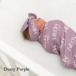 Custom newborn name swaddle and blanket set designed for hospital homecoming, birth announcement photos, and newborn photography sessions. Personalized baby swaddle makes a timeless keepsake and meaningful baby shower gift with a modern, gender-neutral style.