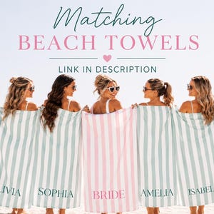 May include: Matching beach towels with vertical stripes in light blue, pink, and white are held by five people on a beach. The towels are personalized with names: Olivia, Sophia, Bride, Amelia, and Isabella. The text "Matching Beach Towels" is at the top.