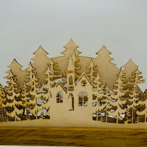 Wooden Christmas decoration arch - Laser cut wood scene with LED lights featuring a church and forest scene. Perfect for window display.