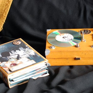 Platine vinyle et album de scrapbooking d'atelier en ligne