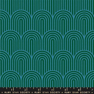 May include: A fabric with a repeating pattern of teal arches on a dark green background. Vertical teal lines fill the top portion of the fabric. The bottom of the fabric has a ruler with the text "RUBY STAR SOCIETY".