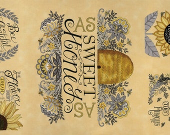 May include: A beige fabric with a floral pattern and bee-themed quotes. The quotes include "Bee Grateful", "The Flower of the Dream Doesn't BIE", "As Sweet As Honey", and "Treasure Natures Tiny Miracles".