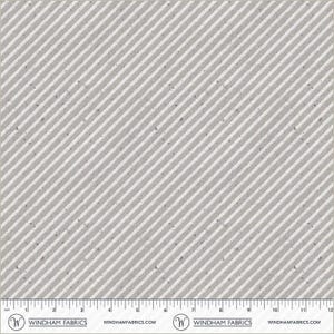 May include: A fabric with a diagonal stripe pattern in shades of gray and white. The fabric has a textured appearance with small, dark flecks. A ruler is at the bottom of the image, with measurements in inches.