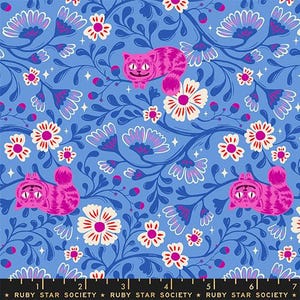 May include: A blue fabric with a repeating pattern of pink Cheshire cats, white and pink flowers, and blue floral vines. The text "RUBY STAR SOCIETY" is printed at the bottom.