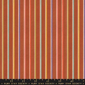 May include: A fabric with a repeating pattern of vertical stripes in various colors, including red, orange, yellow, green, blue, and purple. The background color is a deep brown.