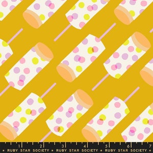 May include: A seamless pattern featuring a repeating design of white popsicles with pink, purple, and yellow polka dots on a mustard yellow background.