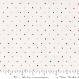 May include: White fabric with a scattered polka dot pattern in shades of pink and red. The fabric is measured in inches.