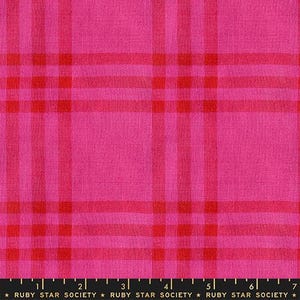May include: Close-up of a pink fabric with a plaid pattern in shades of pink and red. The fabric has a textured appearance. The bottom of the image includes the text "RUBY STAR SOCIETY".