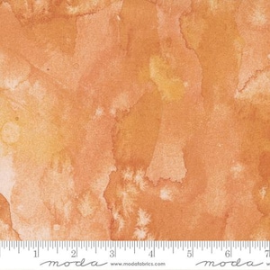 May include: A watercolor-style fabric with a background of light orange and yellow. The fabric has a mottled, uneven texture with shades of orange, yellow, and white.
