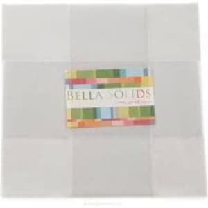 May include: A white, square, fabric panel with a label that reads "Bella Solids" in a colorful striped design.