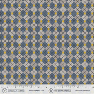 May include: Fabric with a repeating argyle pattern in blue, gray, and yellow. The design features diamond shapes with black lines and yellow accents. The fabric has a textured appearance and a ruler along the bottom edge. The brand name "Windham Fabrics" is printed on the bottom.
