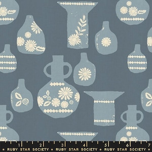 May include: A fabric pattern featuring various blue vases and vessels with white floral and geometric designs. The vases are arranged on a blue background. The text "RUBY STAR SOCIETY" is at the bottom.