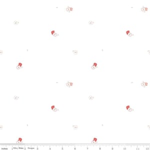 May include: White fabric with a repeating pattern of small pink and white flowers. The fabric is measured in inches.