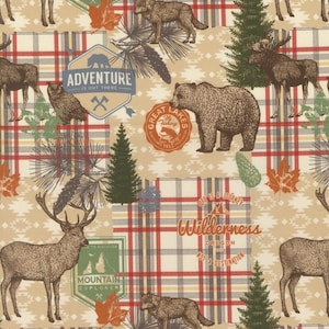 May include: Tan fabric with a plaid pattern featuring woodland animals like deer, bears, and wolves. The design includes text elements such as "Adventure is out there" and "Wilderness Oregon".