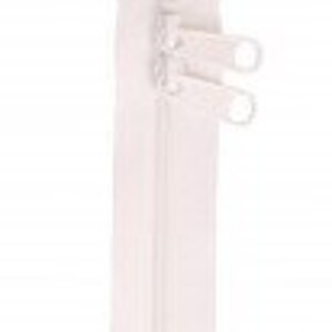 May include: White zipper with two pull tabs. The zipper is closed and has a smooth finish.