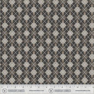 May include: Fabric with a repeating argyle pattern in shades of brown, gray, and white. The design features diamond shapes overlaid with diagonal lines. The fabric has a textured appearance and a ruler is visible along the bottom edge.