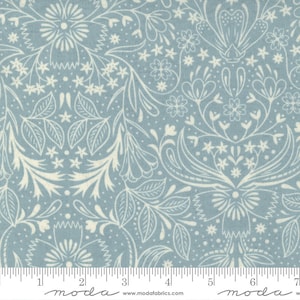 May include: A blue fabric with a white floral pattern. The pattern includes leaves, flowers, and swirls. The fabric is a light blue color with a white background.