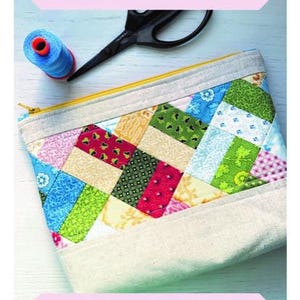 May include: Woven pouch sewing pattern with a colorful patchwork design. The pouch is 7 inches by 10 inches and is described as mini charm and scrap friendly. The pattern is by Chrissy Lux of Sew Lux Fabric.
