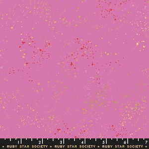 May include: Pink fabric with a scattered pattern of gold and red dots. The fabric is from Ruby Star Society.